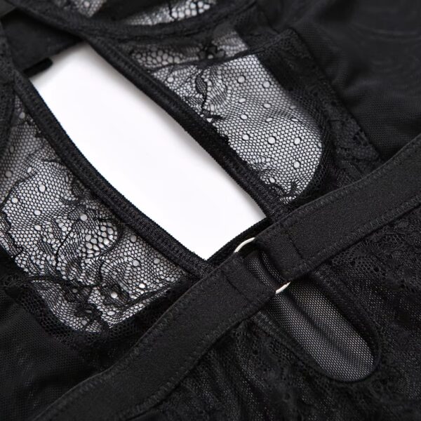 Close-up of the open back of the black bodysuit, showcasing the romantic and seductive design with intricate details.