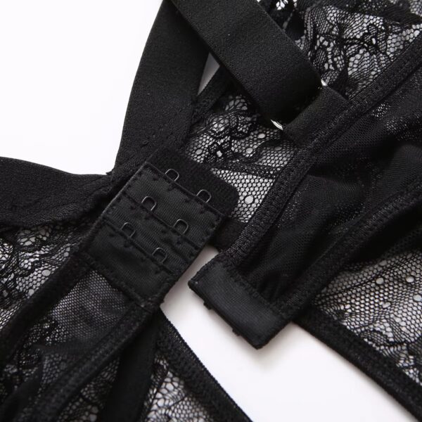 Close-up of the back closure of the black bodysuit, highlighting the romantic and sweet design.