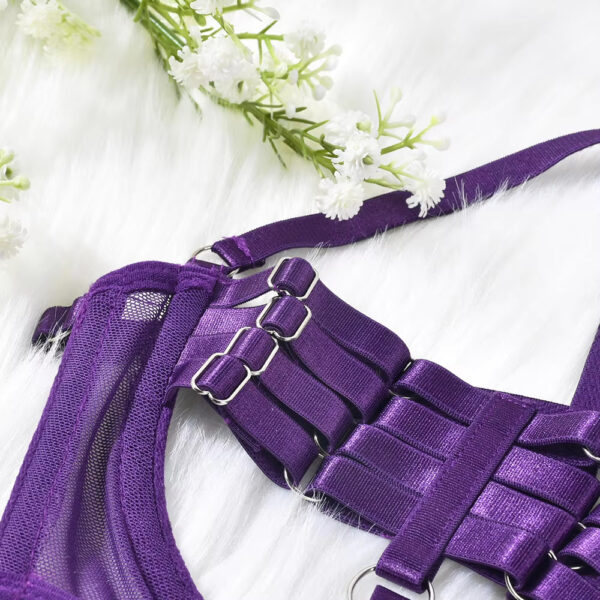 Close-up of the purple semi-transparent bra, emphasizing the intricate and sexy design of the lingerie set.