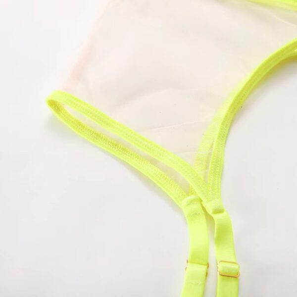 Alternative close-up of the yellow garter belt, highlighting its sexy and daring design as part of the lingerie set.